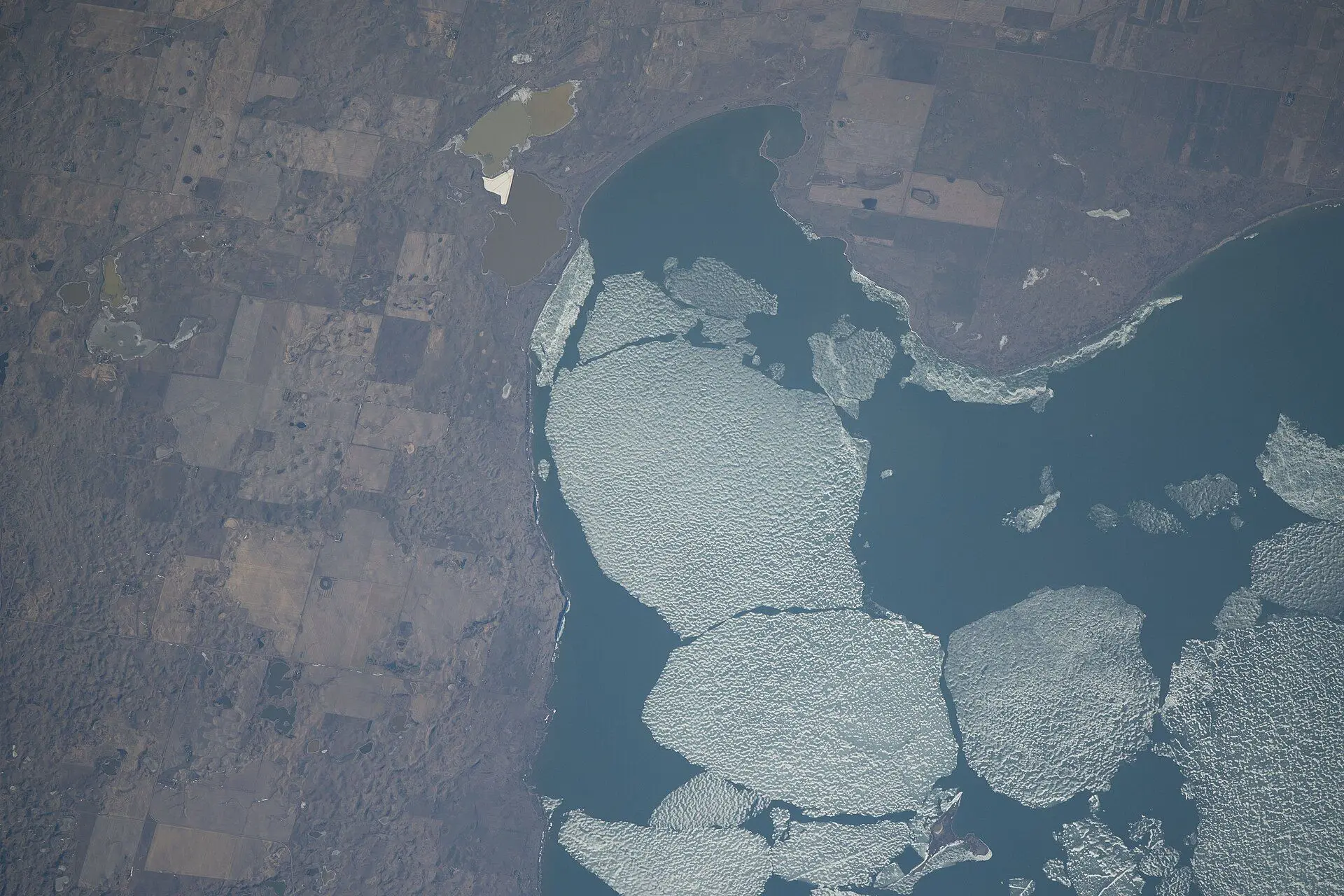 Satellite view of Last Mountain Lake with spring ice